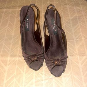 Beautiful rich brown, formal wear fabric sling back peep toe shoe.